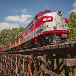 a large long train on a steel track